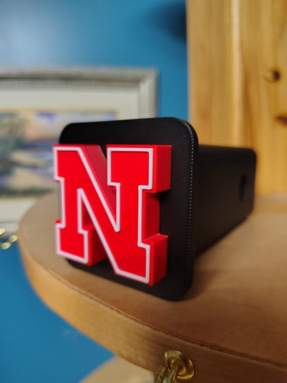 Nebraska Cornhuskers Trailer Hitch Cover, ASA Plastic, Weather Proof, UV Resistant, College Football Decor