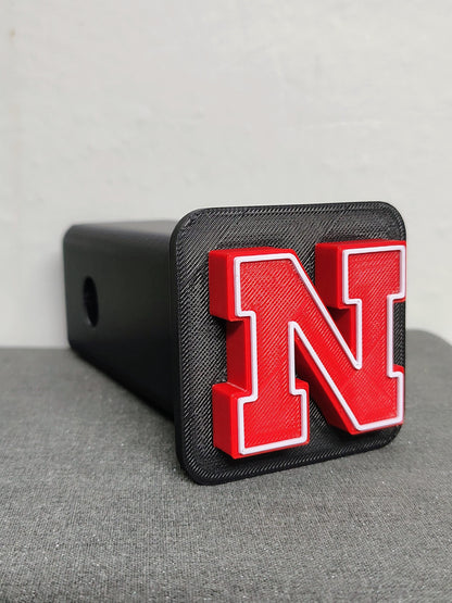 Nebraska Cornhuskers Trailer Hitch Cover, ASA Plastic, Weather Proof, UV Resistant, College Football Decor