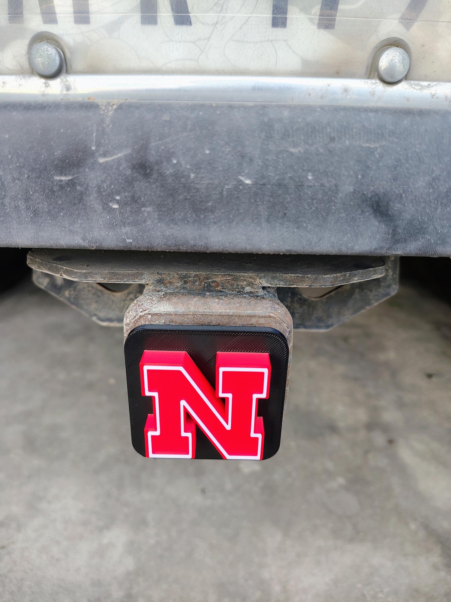 Nebraska Cornhuskers Trailer Hitch Cover, ASA Plastic, Weather Proof, UV Resistant, College Football Decor